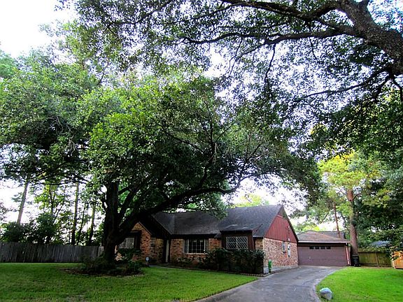 Lot is extra wide with room for parking on the side of 2 Car Garage...great for extra parking or Garage Extension.