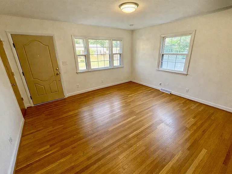 Living room, front door, coat closet