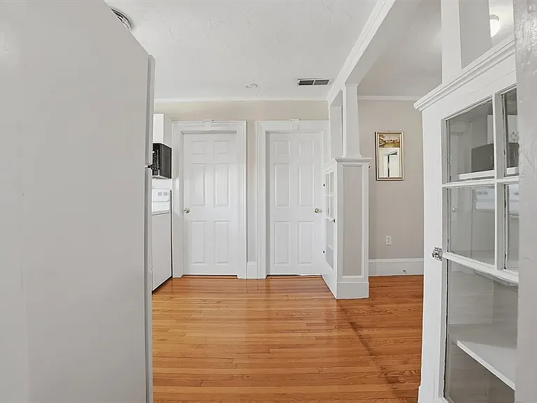 View of entry door for the two bedrooms