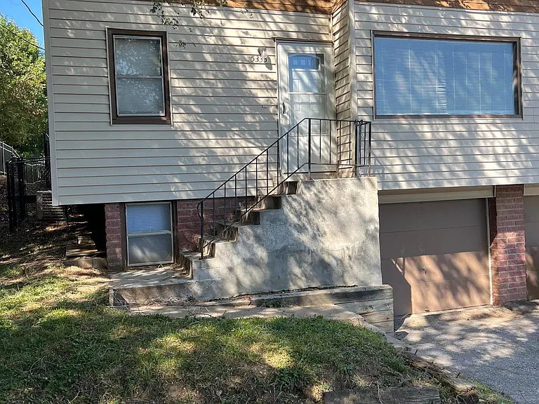 East facing, one car garage with addtnl off-street parking