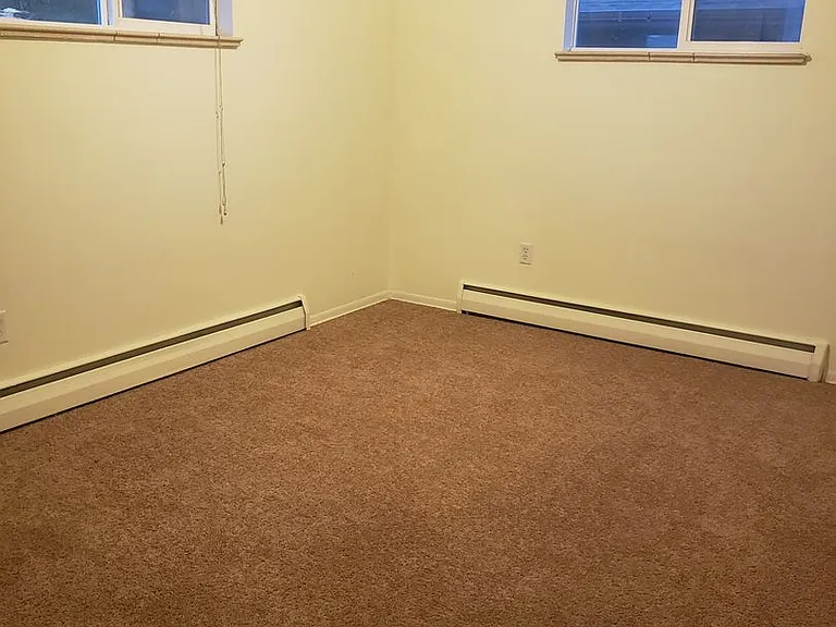 Spacious unit in Lakewood featuring abundant natural light and a central courtyard — Photo 13
