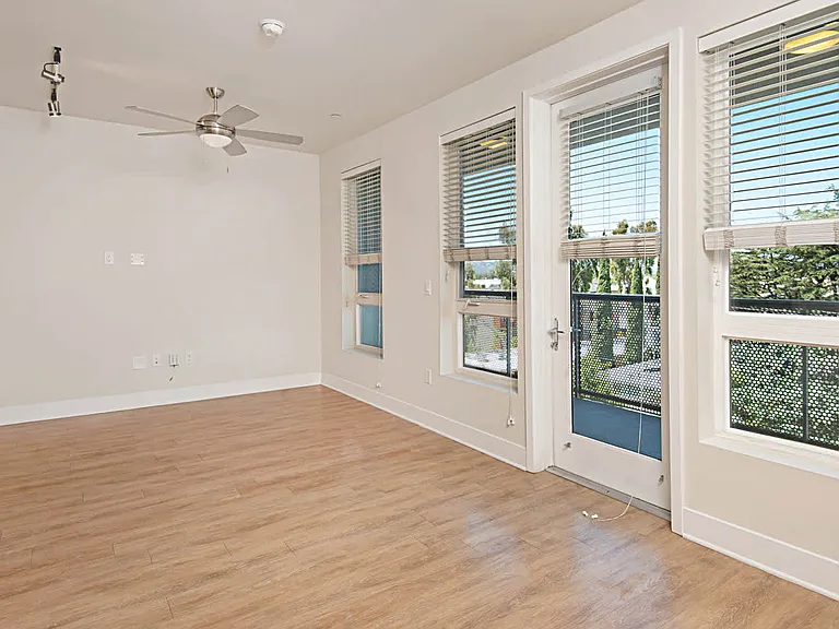 Living Room with Balcony and Hard Surface Flooring