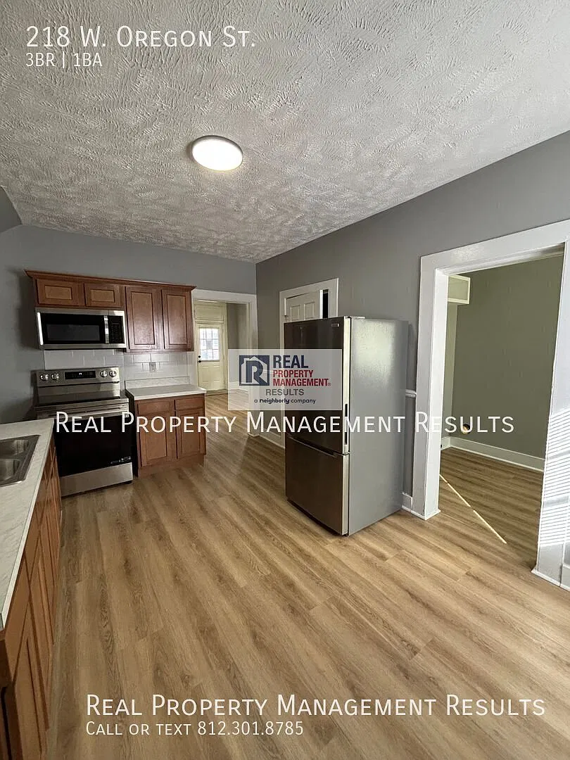 Versatile Home with Flexible Living Space & Fenced Backyard — Photo 4