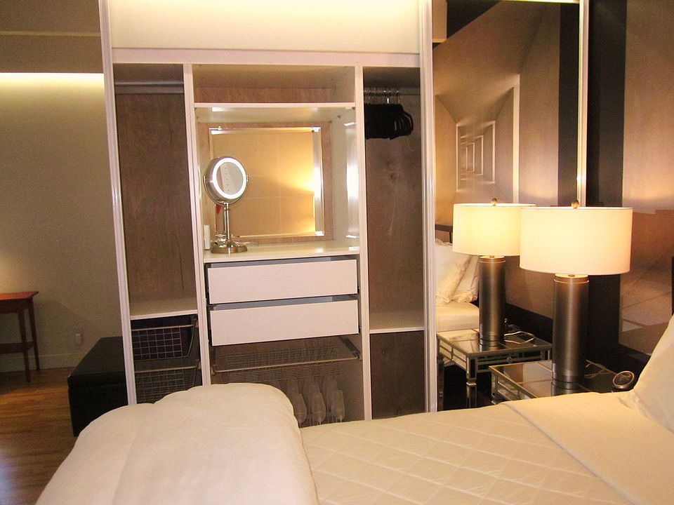 Large, mirrored, bedroom closet