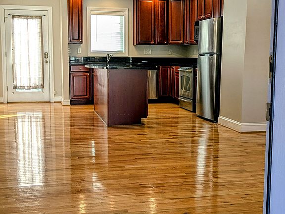 View from front door of living and kitchen