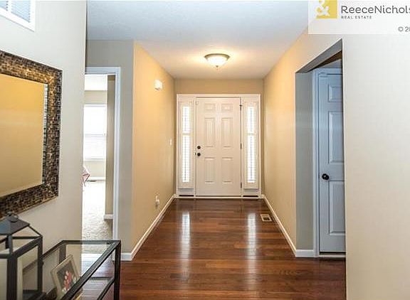 Entryway with wood floors