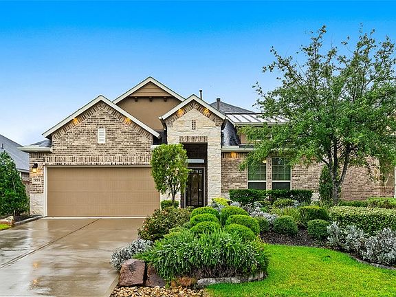 As a former model home, the landscaping, elevation and finishes were selected and created by a team of professionals....and it shows!