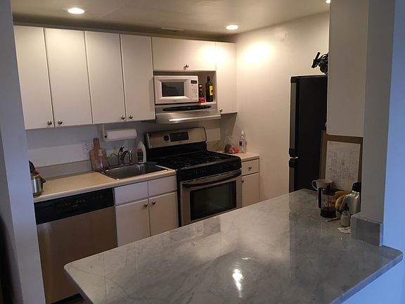 Open kitchen with marble counter