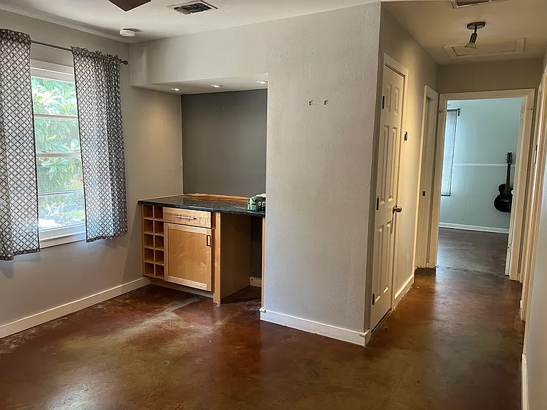 Built in bar area with lighting at dining area.

Hallway: 2 doors on right are bedroom #1 & #2, door straight ahead is bedroom #3, 2 doors on left are storage closet & bathroom
