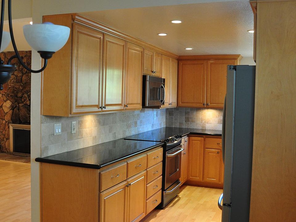 stove and microwave above