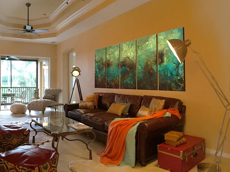 Spacious Living room with Restoration Hardware oversized leather couch and 67" led tv screen