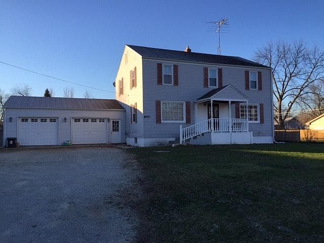 2 story on an acre of land in city