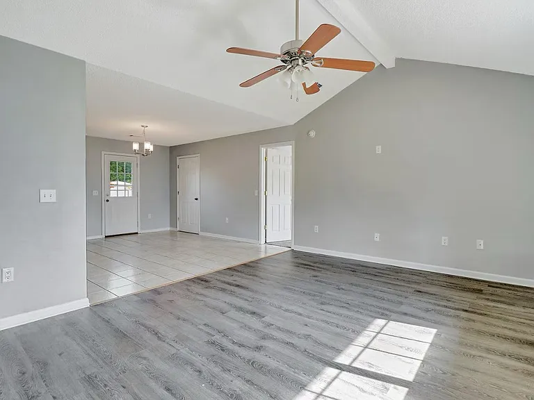 Spacious living room with TV outlet already installed to hire cord.