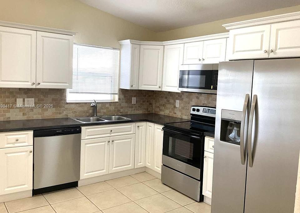 1st image of 7300 W 34th Ct #0