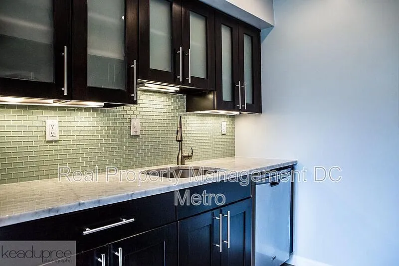 Building Photo - 80 New York Ave NW #203