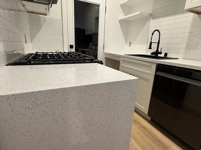 Kitchen w/Solid Surface Stone Waterfall countertops