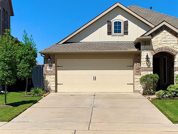 You will be the envy of the neighborhood with such a gorgeous yard, and when all your friends come over, there is plenty of parking with this double wide driveway.