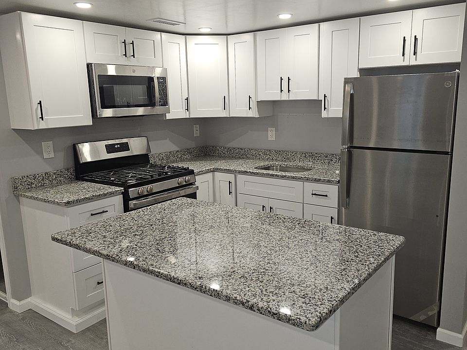 Granite Countertops, Stainless Steel appliances,