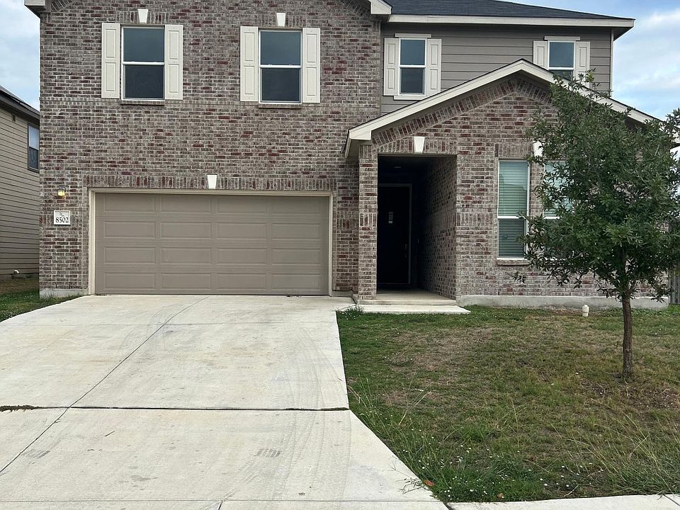Beautiful brick home with 2 car garage on a corner lot