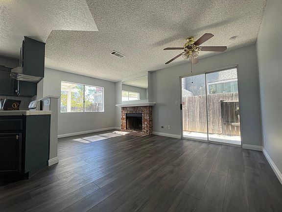 family room with fireplace, breakfast nook