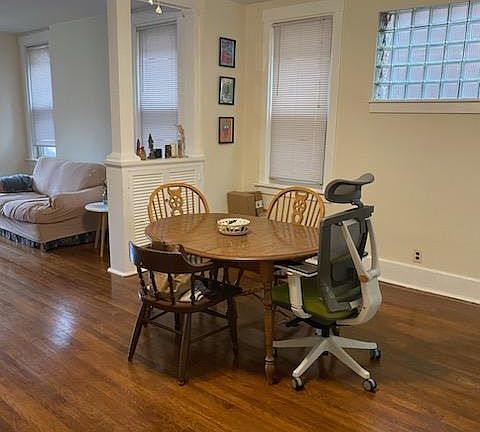 Separate Dining Room will accomodate a large table for family & friends Ceiling Fan, Hardwood Floor