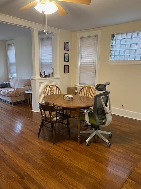 Separate Dining Room will accomodate a large table for family & friends Ceiling Fan, Hardwood Floor