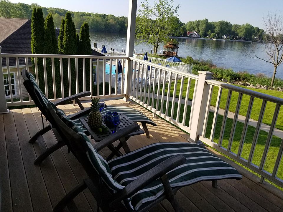 2nd floor deck looking towards water, pool, and clubhouse an