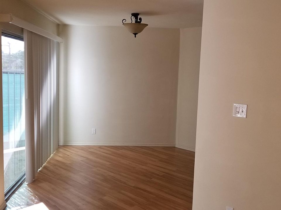 #105 - Dining room with sliding door walkout to pool area