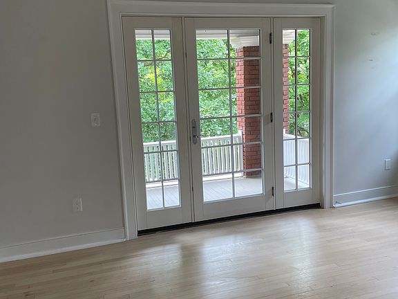 French doors that lead out to the balcony from the living room.