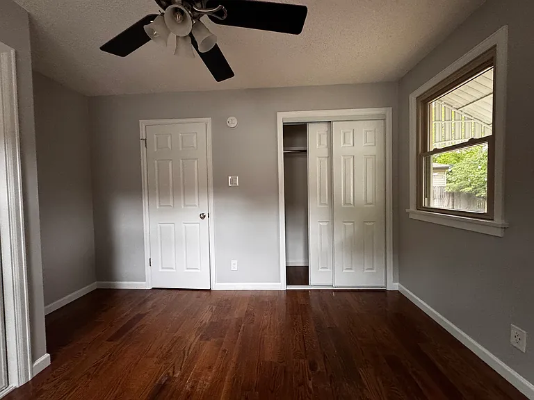Master bedroom with dual closets