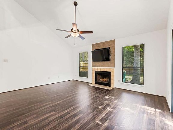 Family Room with high ceilings and fireplace.