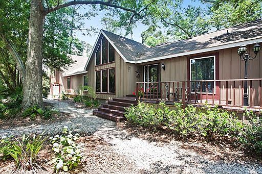 Secluded home on 1.7 breathtaking acres.