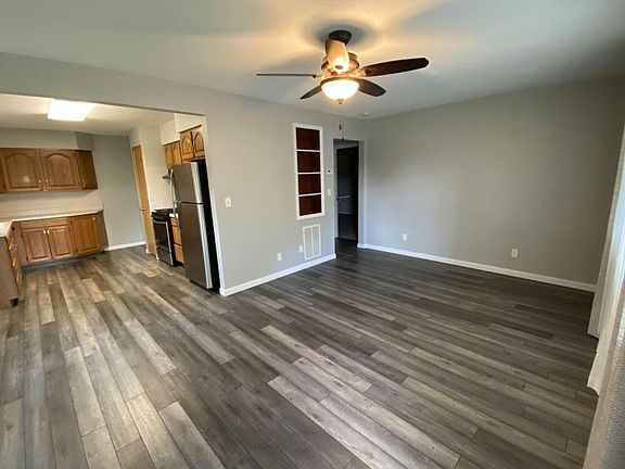 Updated flooring immediately stands out as soon as you enter in through the front door.