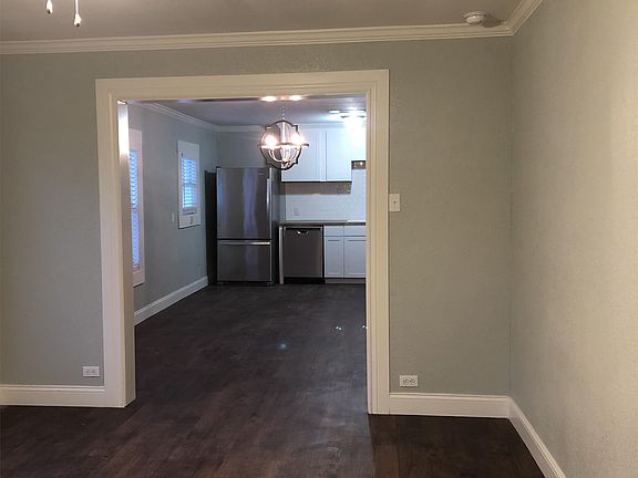 living room looking in to kitchen