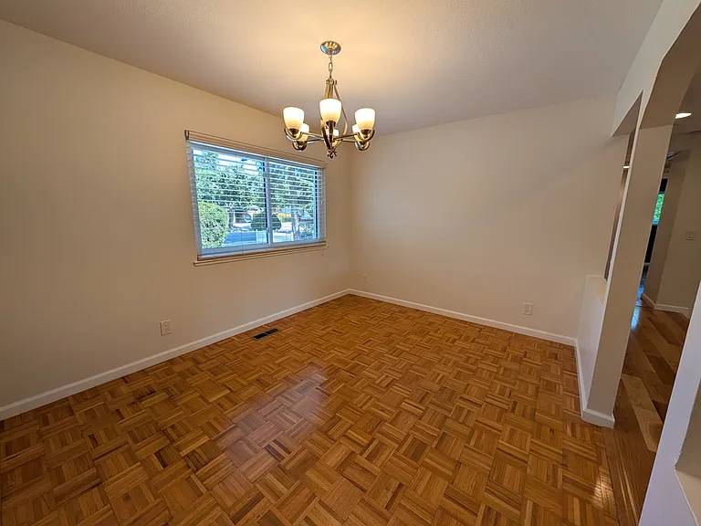 Dining room, facing driveway.