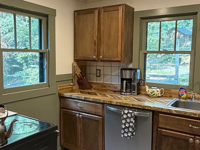 Kitchen with dishwasher and oven