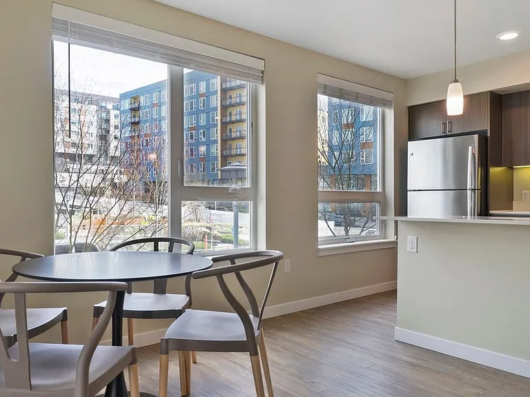 Furnished+ apartment homes include a dining set (Representative Image exact items and style of furnishings may vary)
