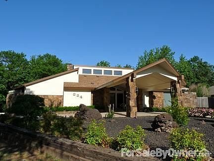 Front of the house
						:
						From a south vantage point. Shows portico.