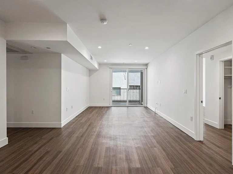 Living Room with Recessed Lighting, Vinyl Flooring, and Patio