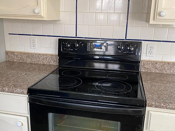 adding microwave above the stove