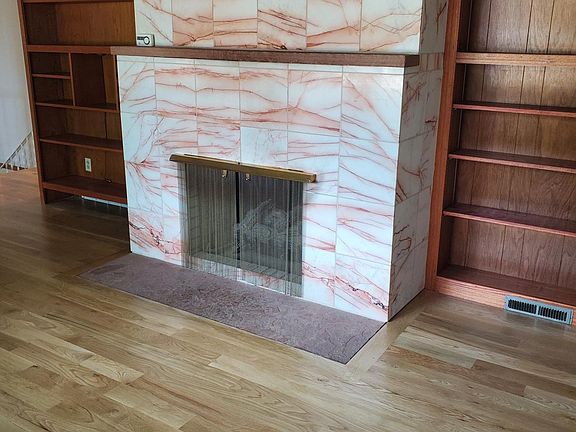 Upstairs fireplace - updated to gas. Hardwood floors are brand new white oak.