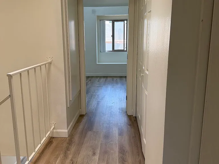 Upstairs Hall way to enter Bedrooms
Laundry Room to the right behind double doors with washer and dryer hook ups