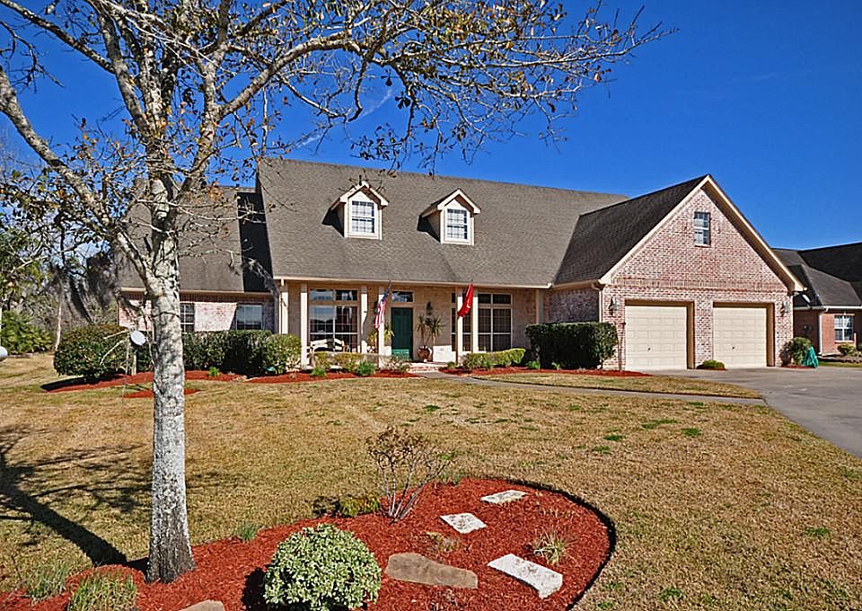 Outstanding curb appeal with professional landscaping.