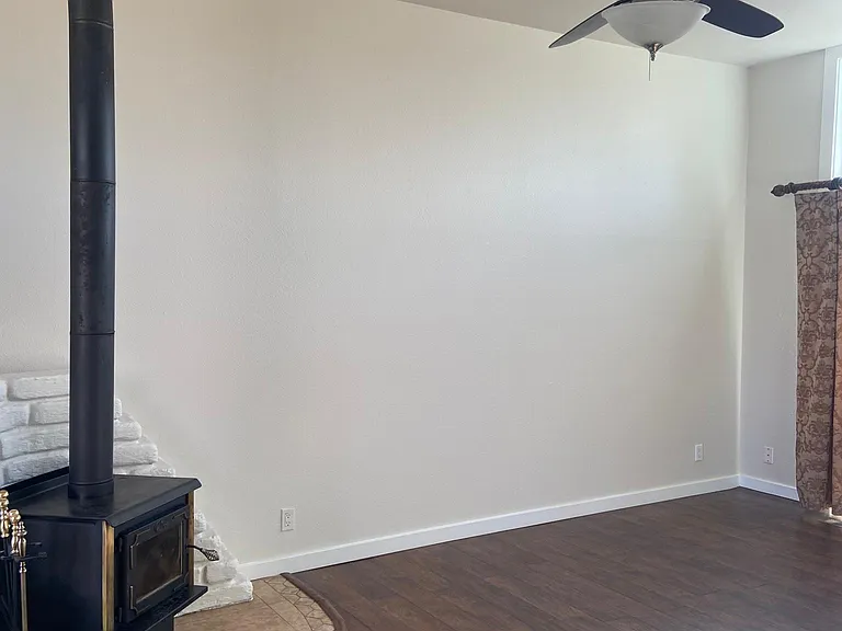 living room with wood stove