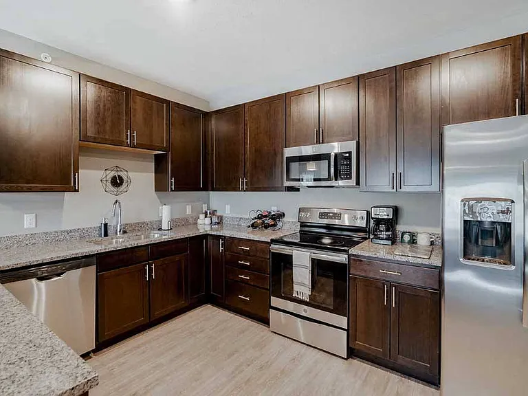 Cook with style in a kitchen that offers plenty of counter space in our 2-bedroom Magnolia.