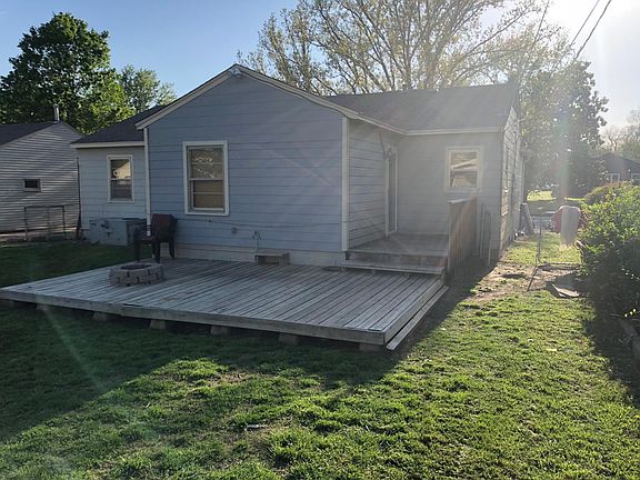 Back of house with Deck