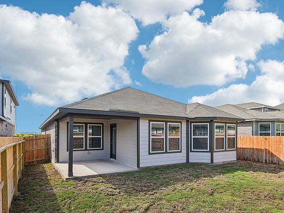 Back exterior of the Callaghan floorplan at a Meritage Homes community.