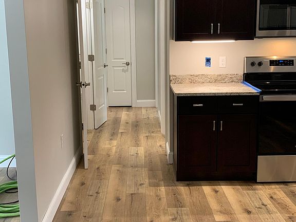 Hallway to bathroom and bedrooms.