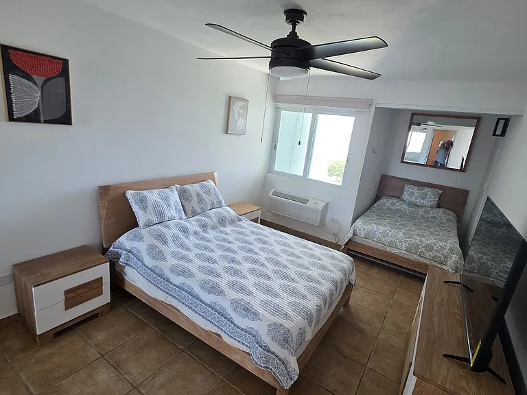 Second bedroom with both a queen bed and full bed for visitors! Large closet a brand new flat screen TV. Brand new high quality and designed furniture, real wood.