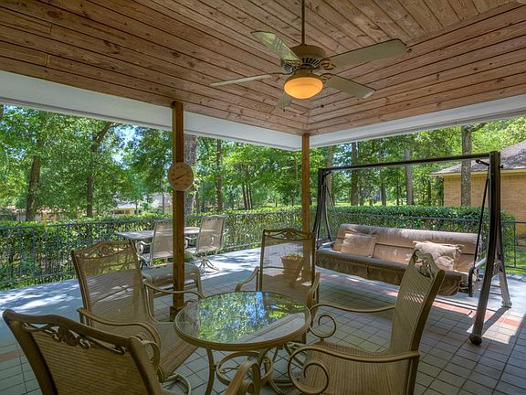 Delightful patio accessed from living area or master bedroom. Note stairs on right which lead to fenced area for pet.